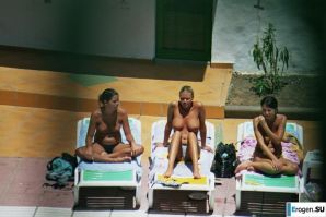 Girls sunbathe topless near the pool. Part 3. Thumb 3