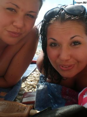 on the beach between us girls. Thumb 3