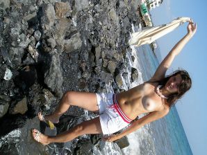 without a swimsuit on a rocky shore. Part 2. Thumb 1