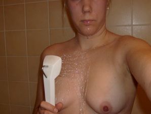 The blonde opened her labia and showed a wet vagina. Thumb 4