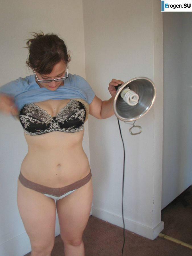 A girl with large breasts poses in clothes and then undresses. Part 2. Photo 2