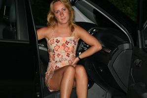 The blonde spread her legs in the car and fingering the clitoris. Thumb 1