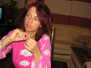 A tanned brunette with a firm body undressed and showed an intimate haircut. Thumb 3